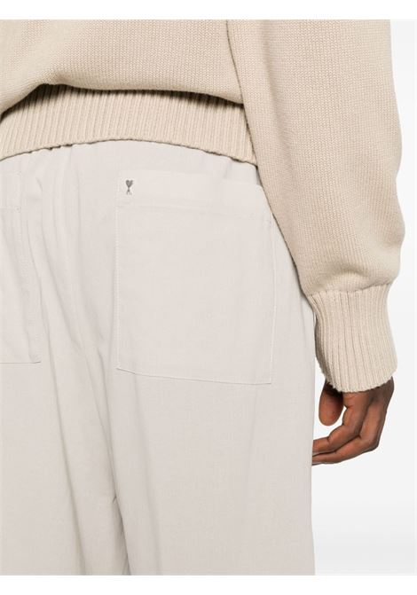 Beige wide-leg trousers - men AMI PARIS | HTR211CO0062271